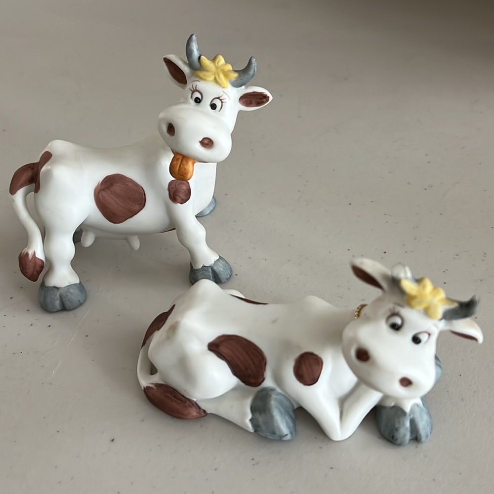 Two cows both made by George good in Taiwan. Rare Jim willoubhey. Vintage